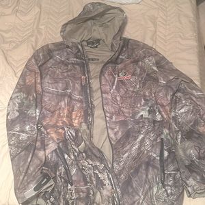 Mossy oak rain and scent proof jacket.  Brand new